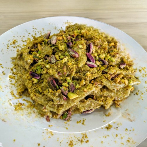 Pasta dish with pistachio granules